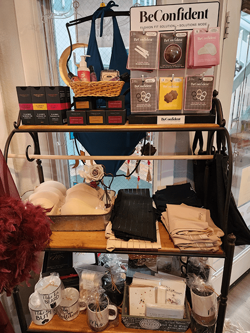 Display showing a variety of intimate products at Shining Moon Boutique